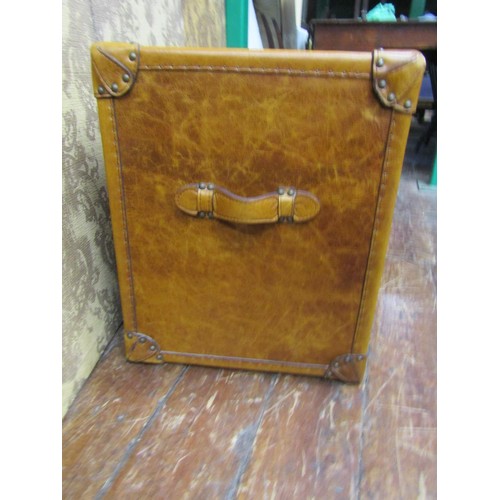 2656 - A pair of studded tan leather three drawer bedside chests