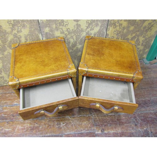 2656 - A pair of studded tan leather three drawer bedside chests