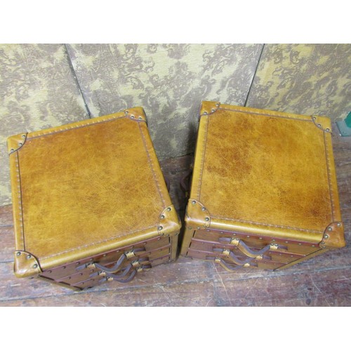 2656 - A pair of studded tan leather three drawer bedside chests