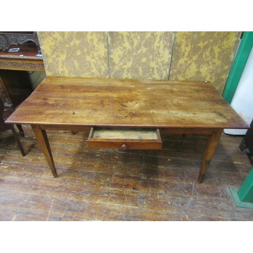 2655 - A provincial French farmhouse table with single frieze drawer raised on square cut legs, 180cm x 90c... 