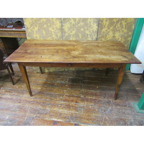 2655 - A provincial French farmhouse table with single frieze drawer raised on square cut legs, 180cm x 90c... 