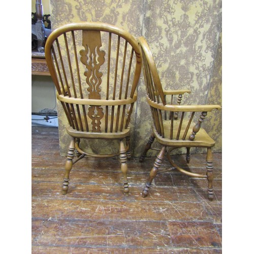 2653 - Pair of elm and fruitwood Windsor chairs, with carved and pierced splats, turned supports and crinol... 