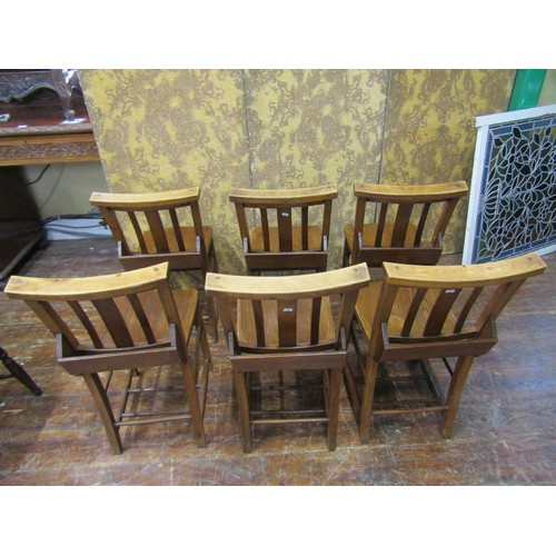 2649 - A set of six church choir chairs, with elm seats and beech wood supports, the stickbacks supporting ... 