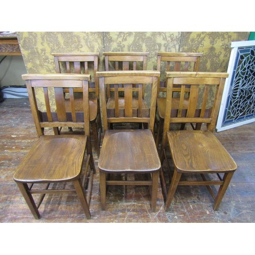 2649 - A set of six church choir chairs, with elm seats and beech wood supports, the stickbacks supporting ... 