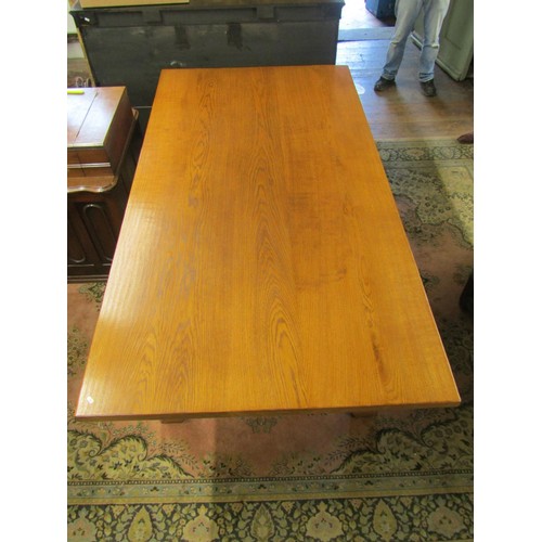 2645 - A good contemporary mid oak refectory table raised on a chamfered X framed base, united by a central... 