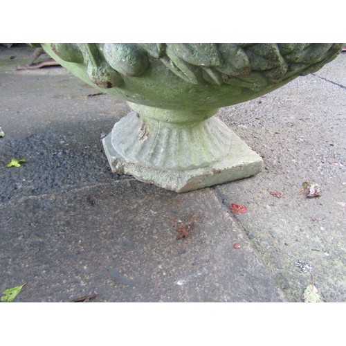 2001 - A weathered cast composition stone garden ornament in the form of a standing classical water maiden ... 