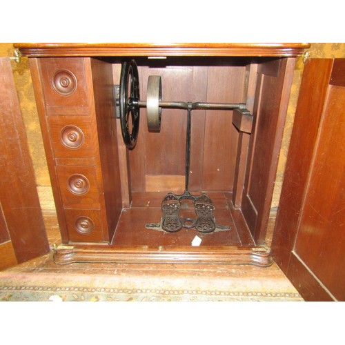 2639 - A rare 1865 Florence Sewing Machine co. in full cabinet no.35908 with floral decoration, complete wi... 