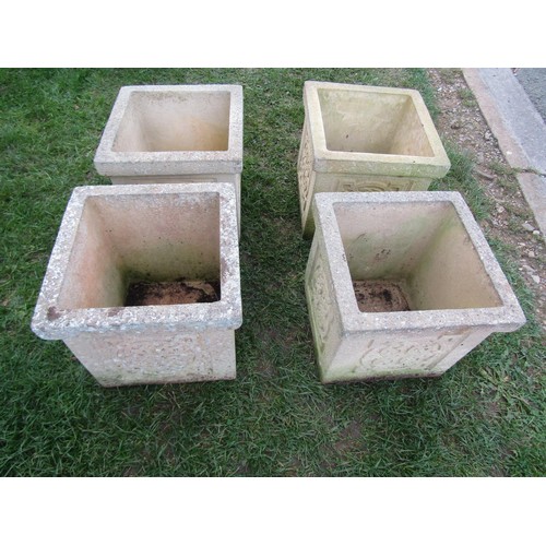 2031 - A run of four weathered cast composition stone planters of square cut form with Celtic knot panels 3... 