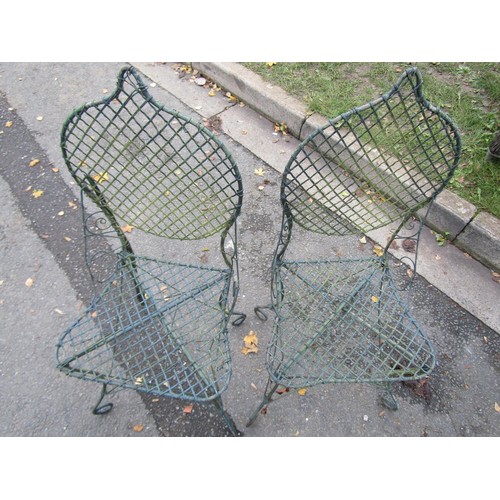 2052 - A pair of small, weathered Ward, work, garden chairs, green painted finish (2)