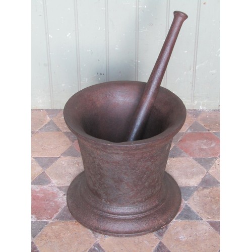 2104 - A large 18th century cast iron pestle and mortar (30cm high, 33cm diameter) (possibly maritime)