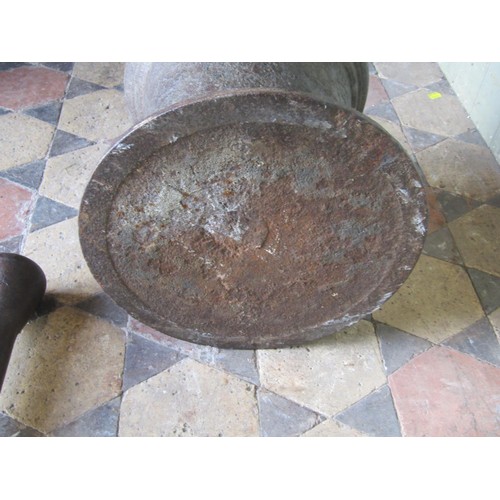 2104 - A large 18th century cast iron pestle and mortar (30cm high, 33cm diameter) (possibly maritime)