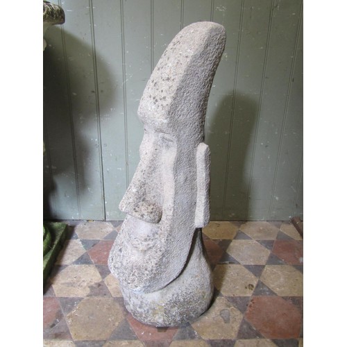 2099 - A tall weathered composition stone figure, after the Easter island figures, 80cm high