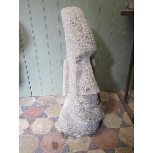 2099 - A tall weathered composition stone figure, after the Easter island figures, 80cm high