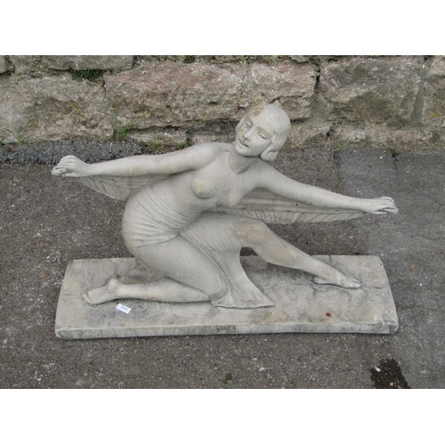 2108 - In the style of Demétre Chiparus, a composition stone figure of a stylised Art Deco lady dancer in a... 