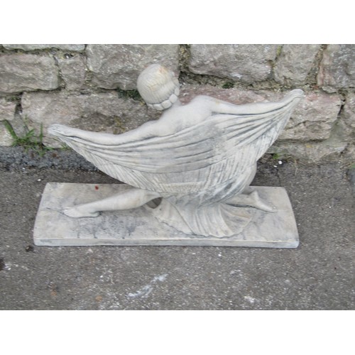 2108 - In the style of Demétre Chiparus, a composition stone figure of a stylised Art Deco lady dancer in a... 