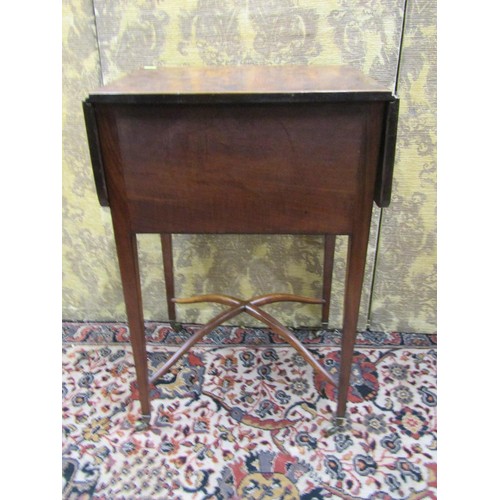 2641 - A regency mahogany ladies sewing table, two frieze drawers enclosed within drop leaves raised on squ... 