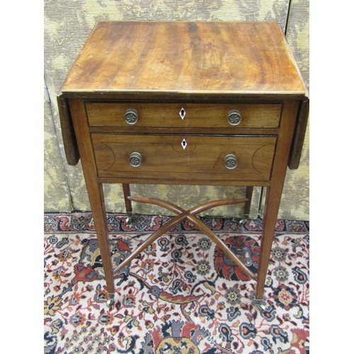 2641 - A regency mahogany ladies sewing table, two frieze drawers enclosed within drop leaves raised on squ... 