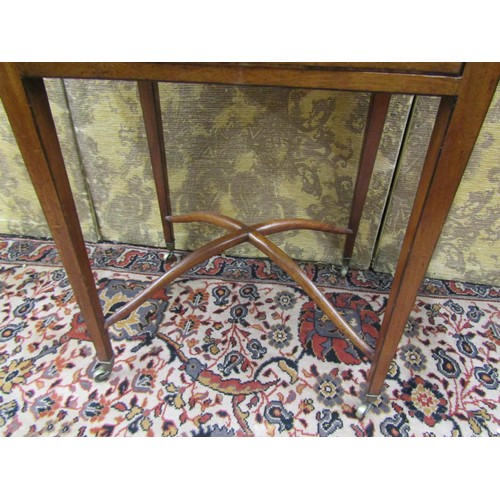 2641 - A regency mahogany ladies sewing table, two frieze drawers enclosed within drop leaves raised on squ... 