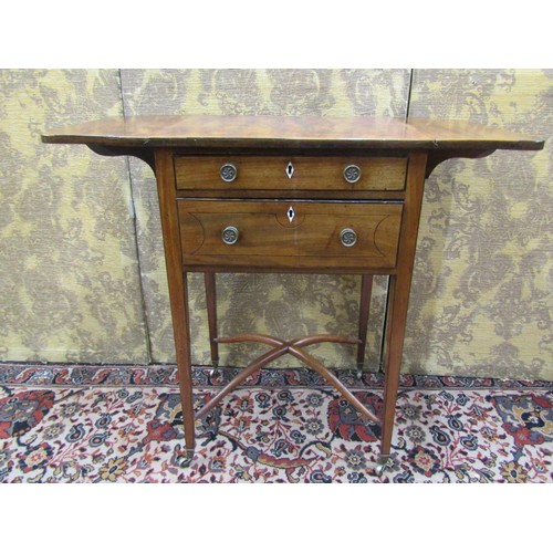 2641 - A regency mahogany ladies sewing table, two frieze drawers enclosed within drop leaves raised on squ... 