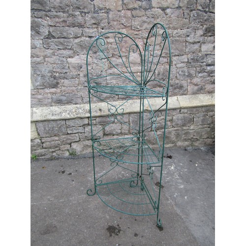 2137 - A three tier wire work plant stand, green painted finish, 130cm high.