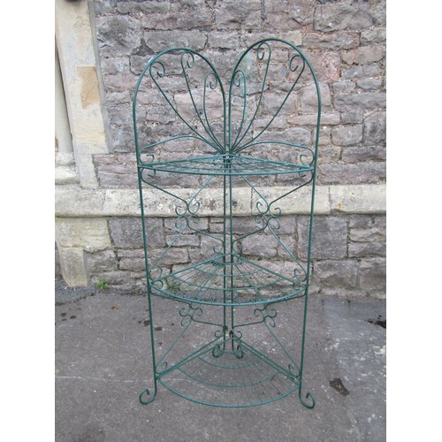 2137 - A three tier wire work plant stand, green painted finish, 130cm high.