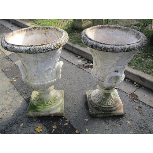 2118 - A large pair of weathered, composition stone garden campagna urn planters, each 82cm high.