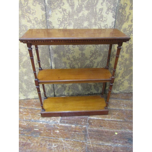 2643 - Edwardian mahogany three tier side table, raised on tapered square cut supports, on a plinth base wi... 