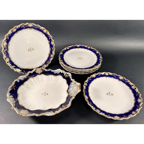 1123 - Seven George Jones blue and gilt plates with armorial detail, some Victorian cranberry glass ware an... 