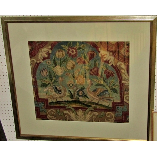 83 - A later framed 19th century embroidered tapestry panel decorated with a pair of Asiatic birds flanki... 