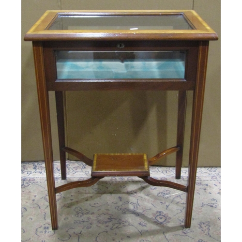 2268 - An Edwardian Inlaid mahogany vitrine, with a locking hinged bevelled cover and glazed panelled sides... 