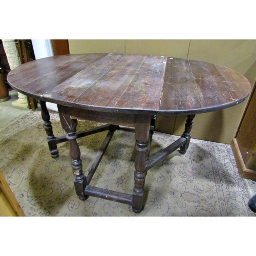 2293 - An 18th century and later, oak gate leg dining table, 78 cm high, 144 x 102 cm