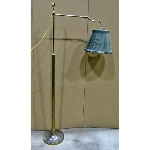 2303 - An Edwardian adjustable brass standard / reading lamp, 104cm