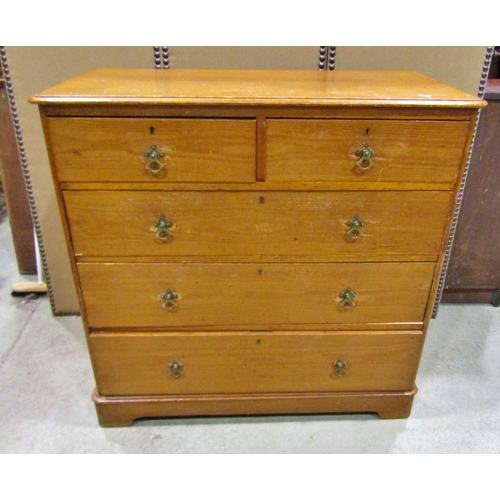 2299 - A 19th century pine chest of two short and three long drawers, fitted with gothic style brass loopin... 