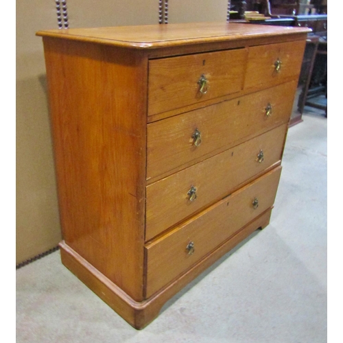 2299 - A 19th century pine chest of two short and three long drawers, fitted with gothic style brass loopin... 