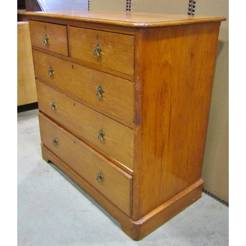 2299 - A 19th century pine chest of two short and three long drawers, fitted with gothic style brass loopin... 