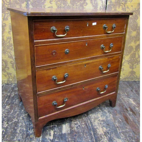 Small 19th century mahogany chest of four long drawers on swept supports, 69 cm wide