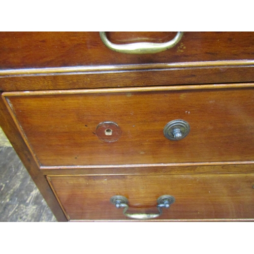 2732 - Small 19th century mahogany chest of four long drawers on swept supports, 69 cm wide