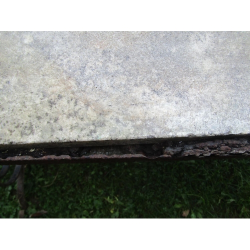 2094 - A large weathered  ironwork table with scrolled framework and inset marble top, 75cm high, 197 long ... 