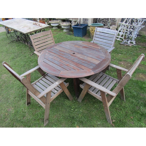 2095 - A Clarecraft contemporary weathered teak garden table with circular slatted top 120 cm diameter toge... 