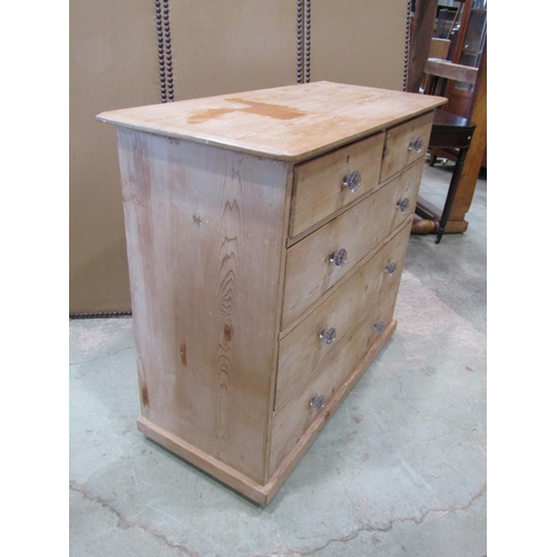 2225 - A old pale pine chest of two short and three long drawers, fitted with pressed clear glass handles, ... 