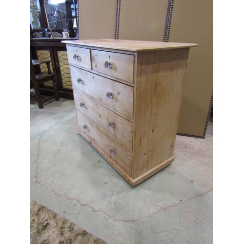 2225 - A old pale pine chest of two short and three long drawers, fitted with pressed clear glass handles, ... 