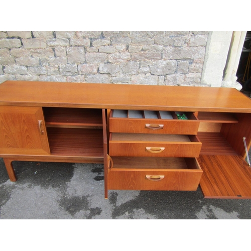 2279 - A G-Plan teak sideboard, labelled to door interior, 81cm high, 205 x 46cm.