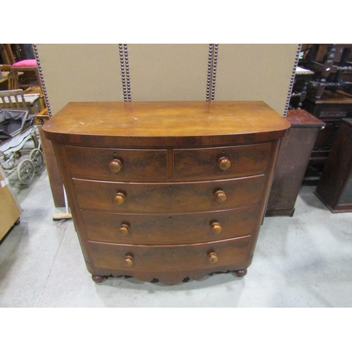 2289 - A good quality Victorian flamed mahogany bow fronted chest of two short and three long drawers, with... 