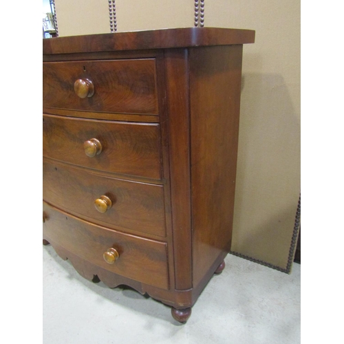 2289 - A good quality Victorian flamed mahogany bow fronted chest of two short and three long drawers, with... 