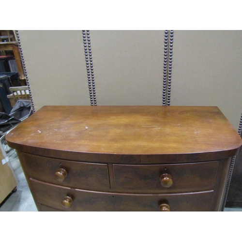 2289 - A good quality Victorian flamed mahogany bow fronted chest of two short and three long drawers, with... 