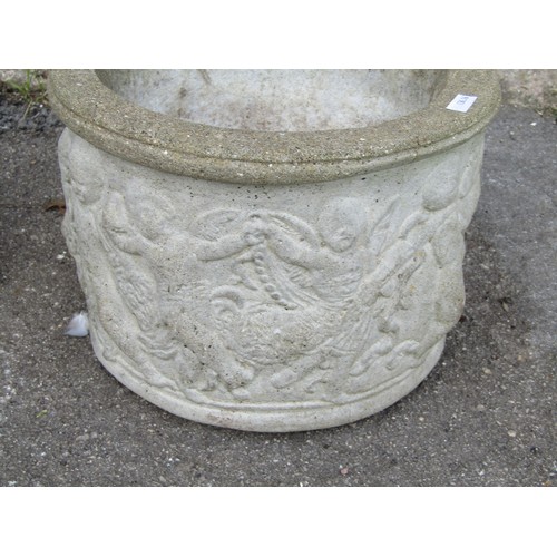 2106 - A small, weathered, composition, stone planter of cylindrical form, moulded, three cherubs, 21 cm hi... 