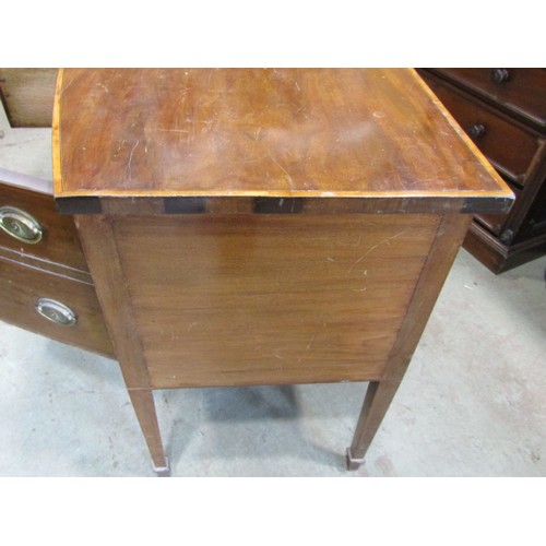 2266 - A very large 19th century bow-fronted mahogany sideboard, the banded top over an arrangement of draw... 