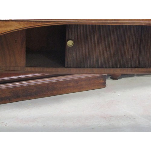 2266 - A very large 19th century bow-fronted mahogany sideboard, the banded top over an arrangement of draw... 