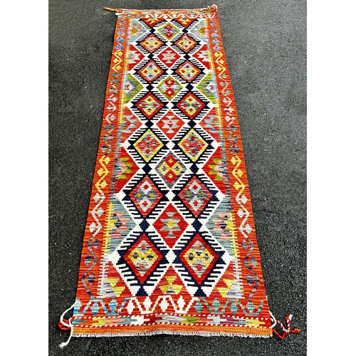 1772 - Chobi kilim runner with a multi coloured repeating diamond pattern  253 x 82 cm approx