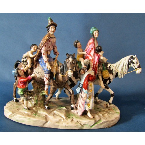 1063 - A large Naples porcelain figure group, figures on horseback with children in attendance, 21 cm high,... 